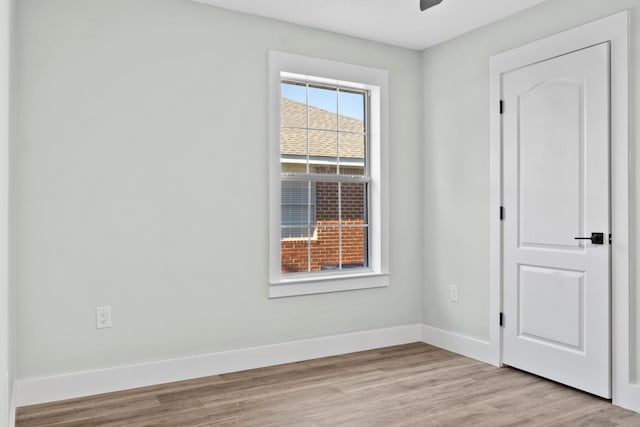 empty room with light wood-type flooring