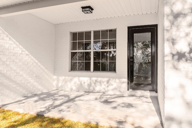 59 Marigot Bay Cir, Miramar Beach, FL 32550 - doorway to property with a patio area