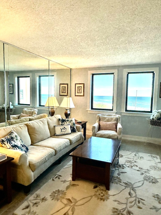 living room with a textured ceiling