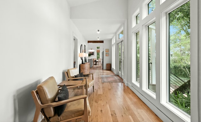 hall with light wood-type flooring