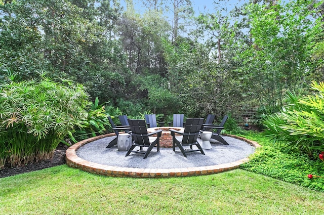 view of patio with an outdoor fire pit