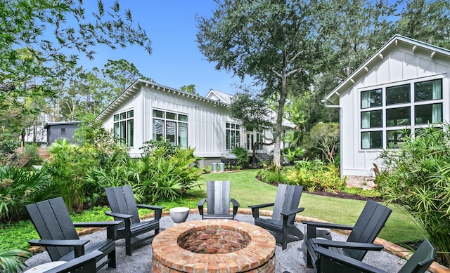 view of patio with an outdoor fire pit