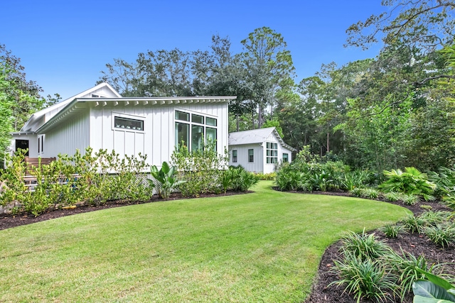 exterior space with a lawn