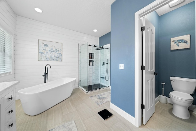 full bathroom with shower with separate bathtub, vanity, toilet, and wood walls