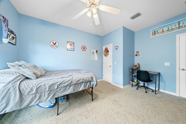 carpeted bedroom with ceiling fan