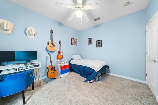 carpeted bedroom with ceiling fan