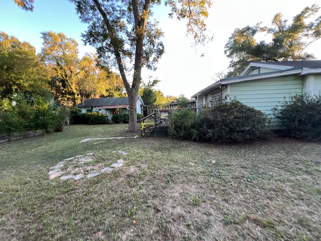 view of yard featuring a wooden deck