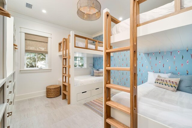 bedroom featuring crown molding