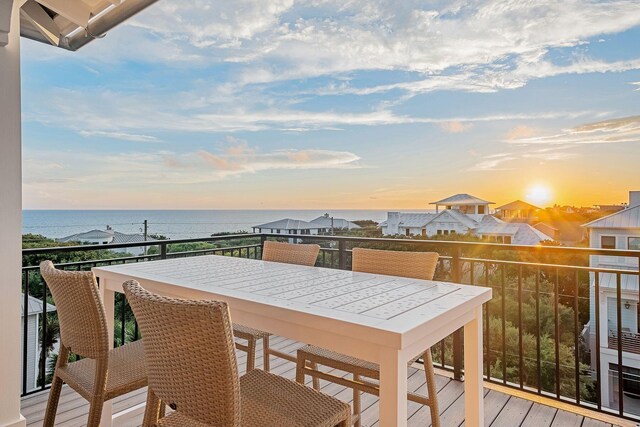 deck at dusk with a water view