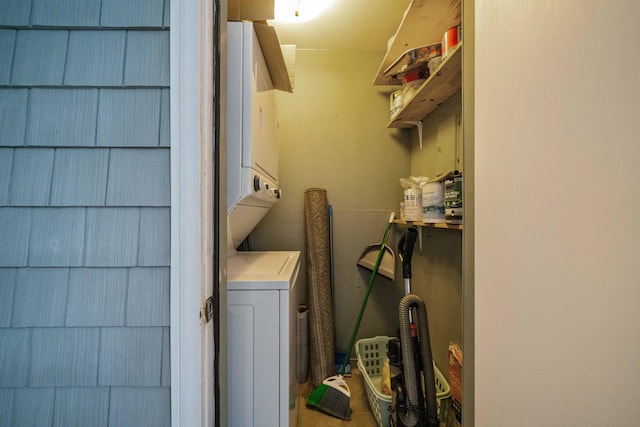 laundry area featuring stacked washer and dryer