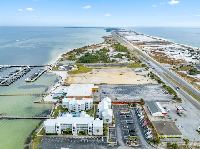 aerial view featuring a water view and a view of the beach