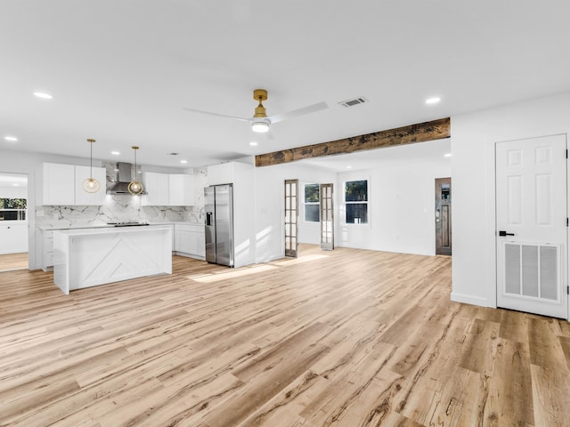 274 S 20th St, Defuniak Springs, FL 32435 - unfurnished living room featuring recessed lighting, light wood-style floors, healthy amount of natural light, ceiling fan, and baseboards