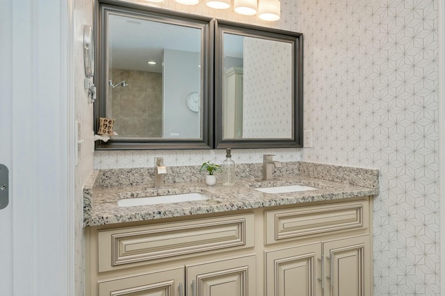 bathroom featuring decorative backsplash and vanity