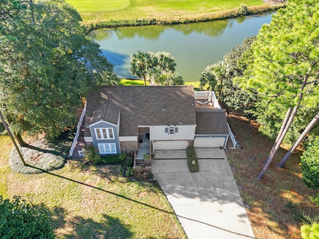 birds eye view of property featuring a water view