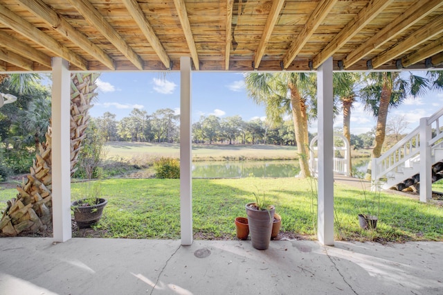 view of patio / terrace with a water view