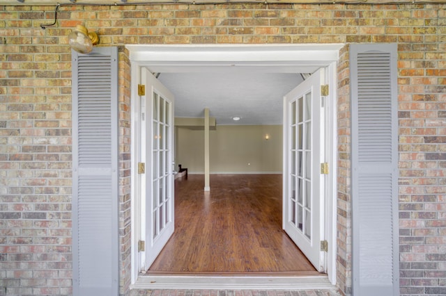 entrance to property featuring french doors