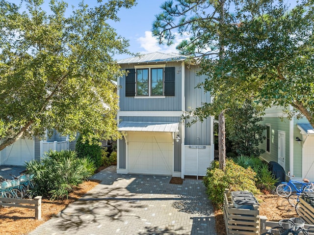 view of front of property with a garage