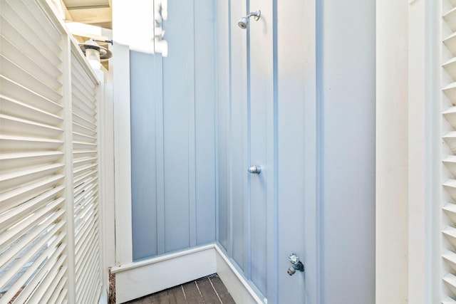 exterior space with dark hardwood / wood-style flooring and radiator