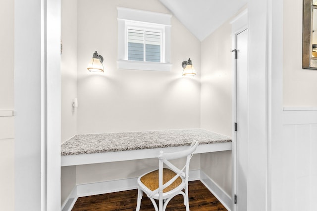 bathroom with hardwood / wood-style floors and vaulted ceiling