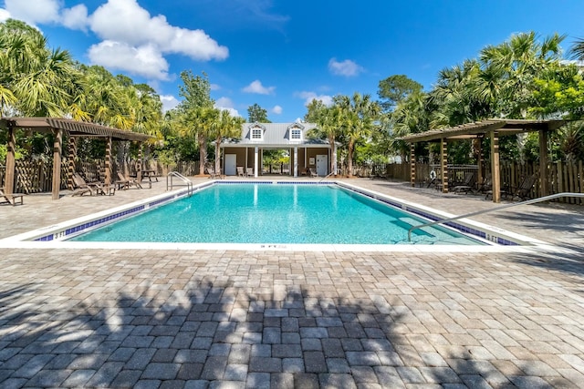 view of swimming pool with a patio area