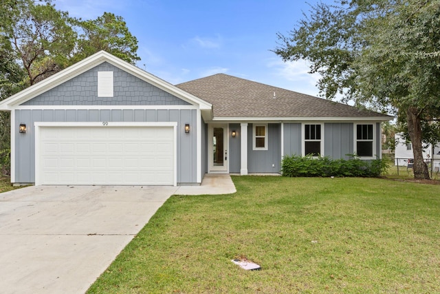 single story home with a front yard and a garage