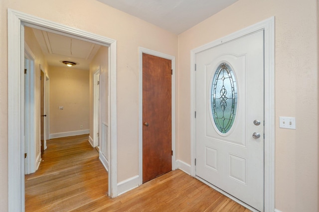 entrance foyer with light hardwood / wood-style floors