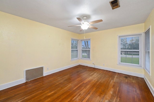 unfurnished room with ceiling fan and hardwood / wood-style floors