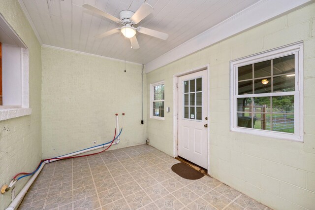 interior space featuring ceiling fan