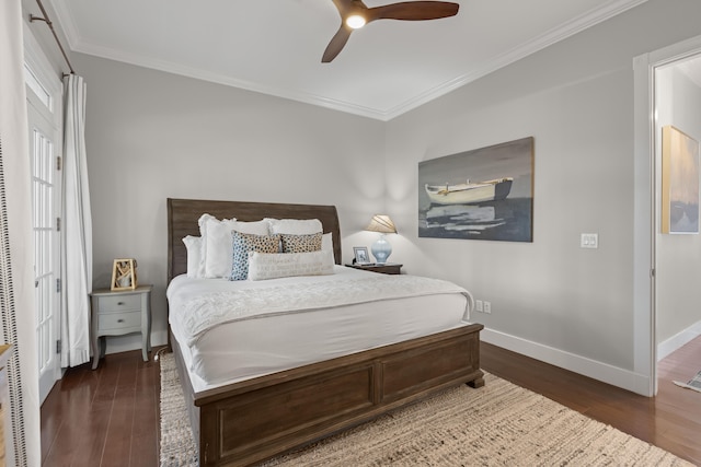 bedroom featuring a closet, ceiling fan, dark hardwood / wood-style flooring, and crown molding