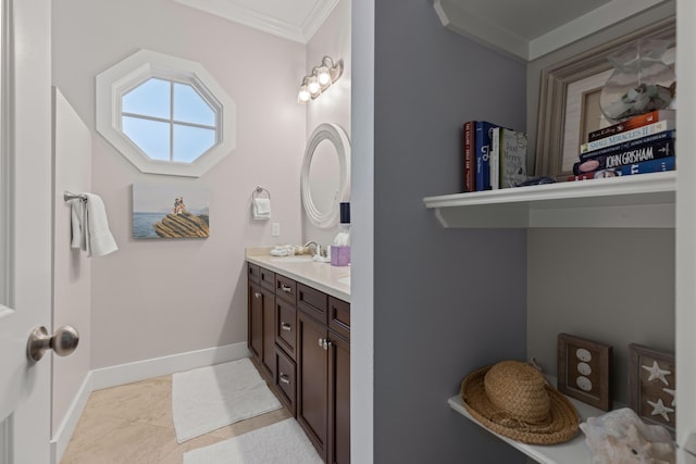 bathroom featuring vanity, tile patterned floors, and ornamental molding