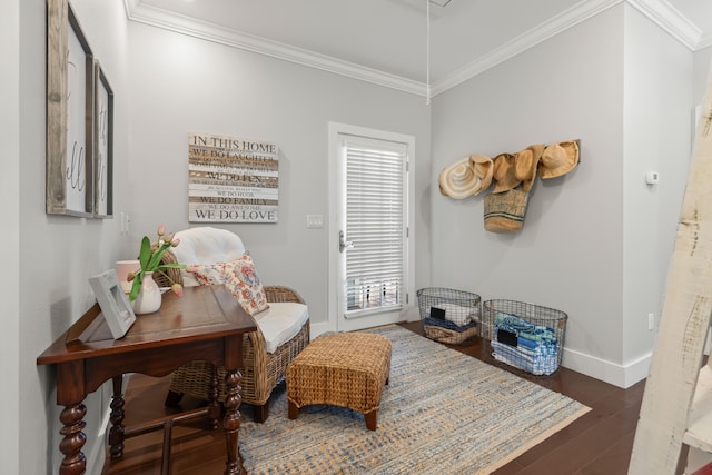 living area featuring dark hardwood / wood-style floors, a wealth of natural light, and crown molding