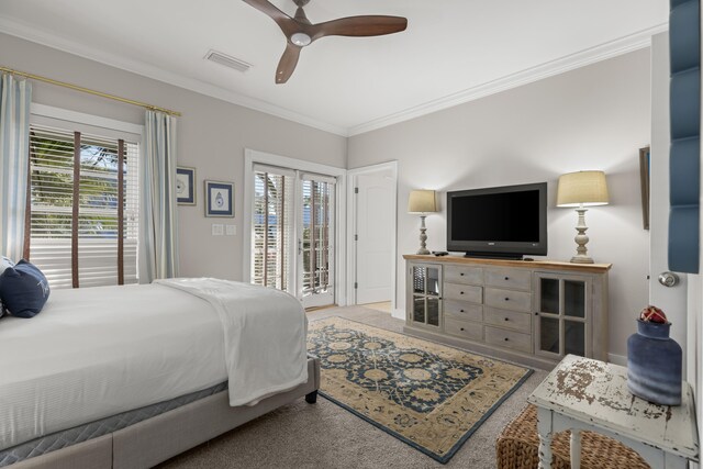 bedroom featuring ceiling fan, access to exterior, and ornamental molding