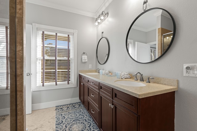 bathroom featuring tile patterned floors, vanity, and ornamental molding