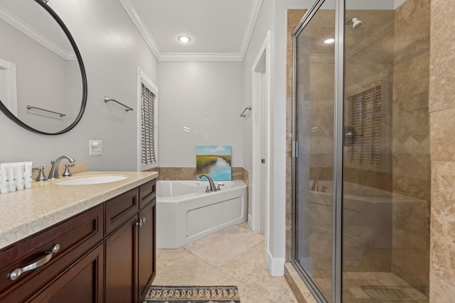 bathroom with tile patterned floors, vanity, ornamental molding, and shower with separate bathtub