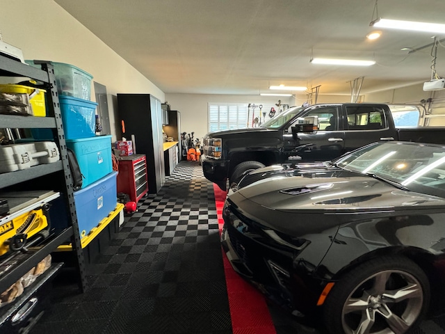 garage featuring a garage door opener