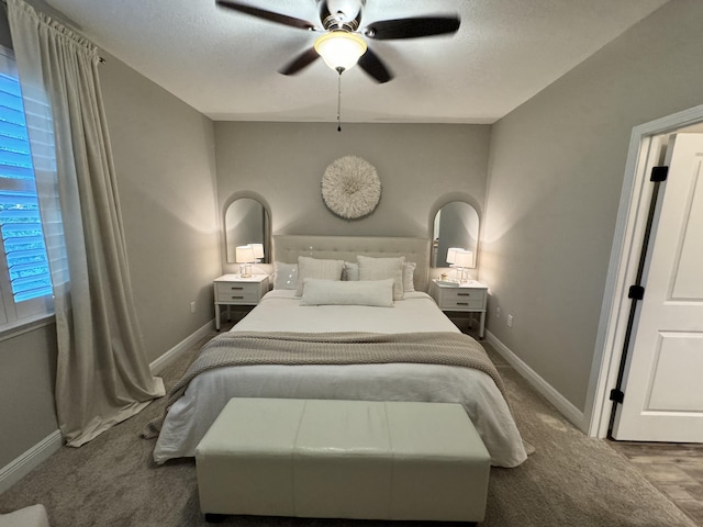 624 Tournament Ln, Freeport, FL 32439 - bedroom with carpet, baseboards, and a ceiling fan