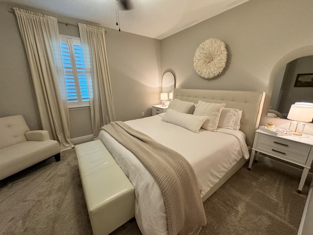 carpeted bedroom with ceiling fan