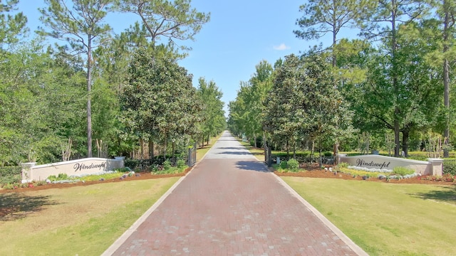 view of community with a lawn