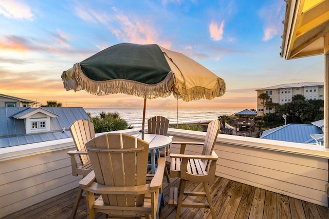 deck at dusk with a water view