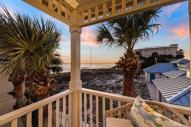 deck at dusk with a water view