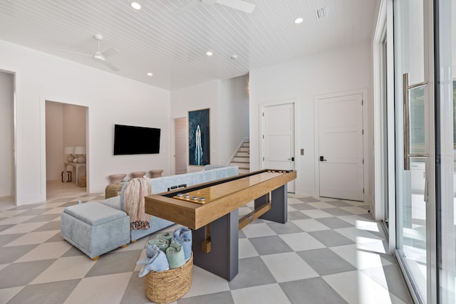 recreation room featuring ceiling fan and wood ceiling