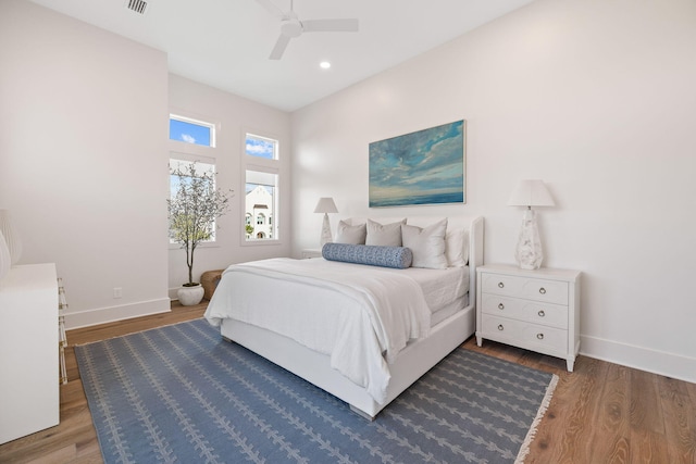 bedroom featuring ceiling fan and wood-type flooring