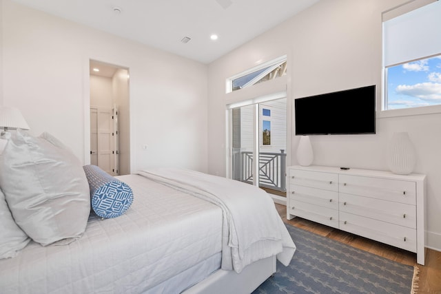 bedroom featuring dark hardwood / wood-style floors