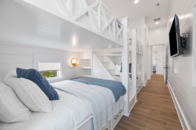 bedroom featuring wood-type flooring