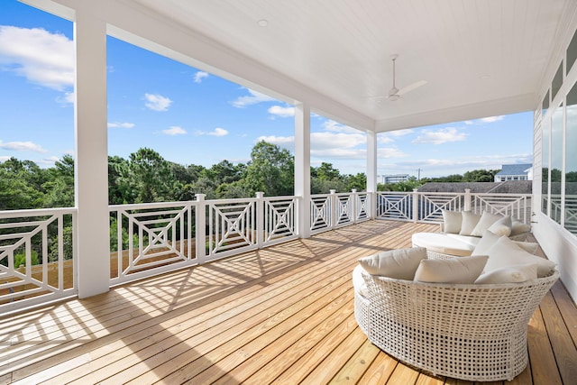 wooden terrace with ceiling fan