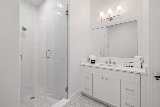 bathroom featuring vanity and an enclosed shower