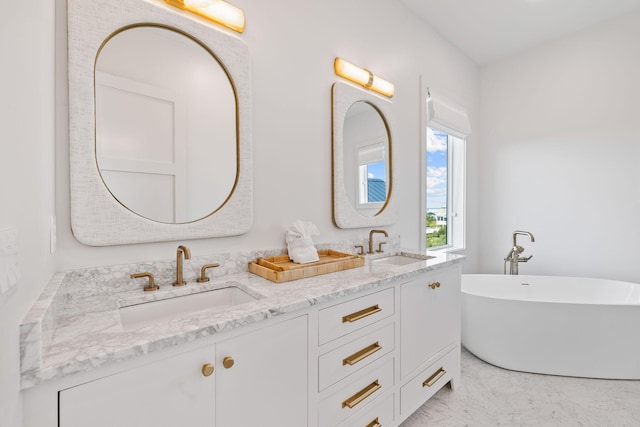 bathroom with vanity and a bathing tub