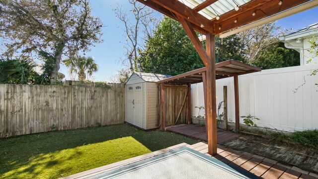 deck featuring a yard and a shed