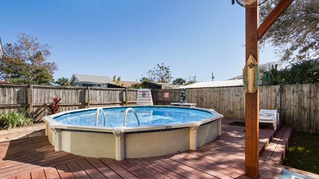 view of pool with a deck