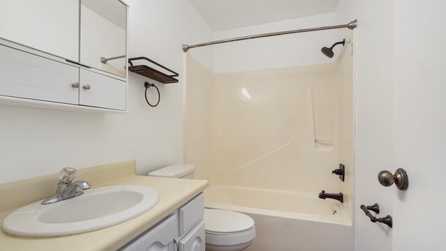 full bathroom featuring vanity, toilet, and shower / bathtub combination